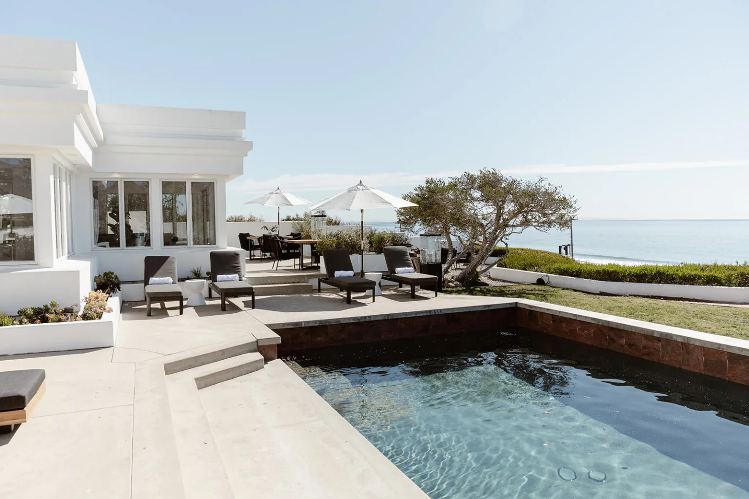 Ocean-view pool at Oro House's Zuma Beach House in Malibu