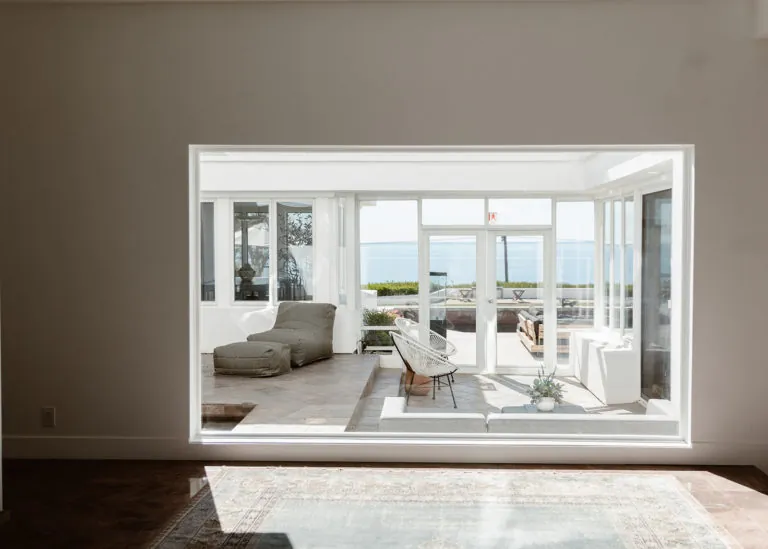 Sunroom with ocean views at Oro House's luxury rehab in Malibu